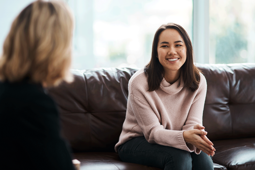 young woman asking her therapist what are the benefits of an intensive outpatient program
