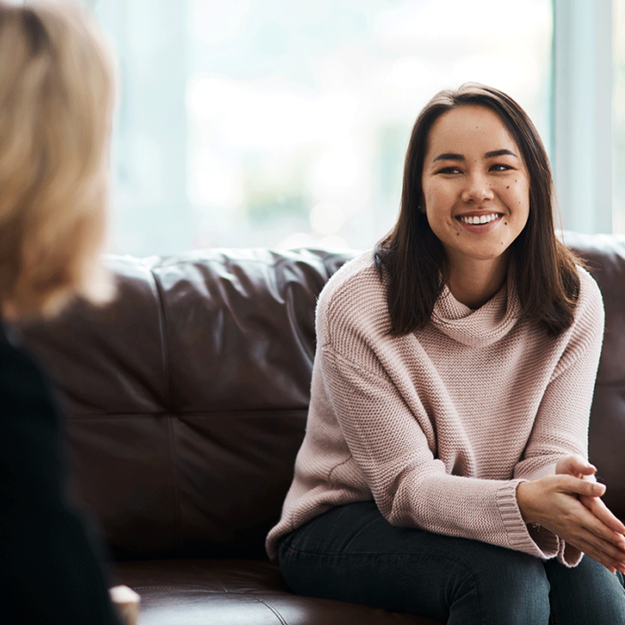 young woman asking her therapist what are the benefits of an intensive outpatient program