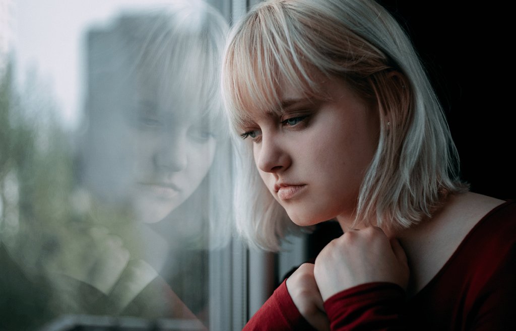 teenage girl staring forlornly out window wondering how long does it take for benzos to become addictive