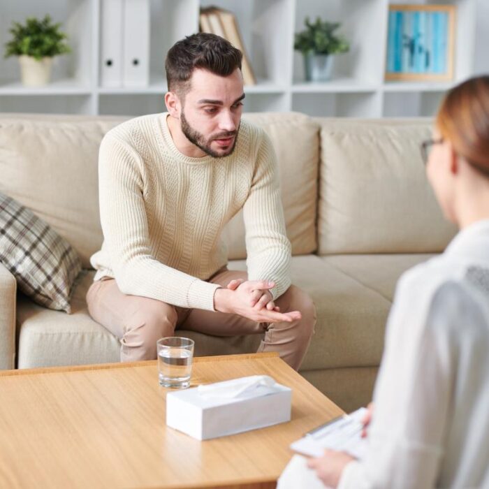 young man asking his female therapist what are some commonly abused prescription drugs