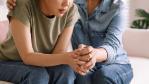 A person supports another person who is struggling with substance abuse.