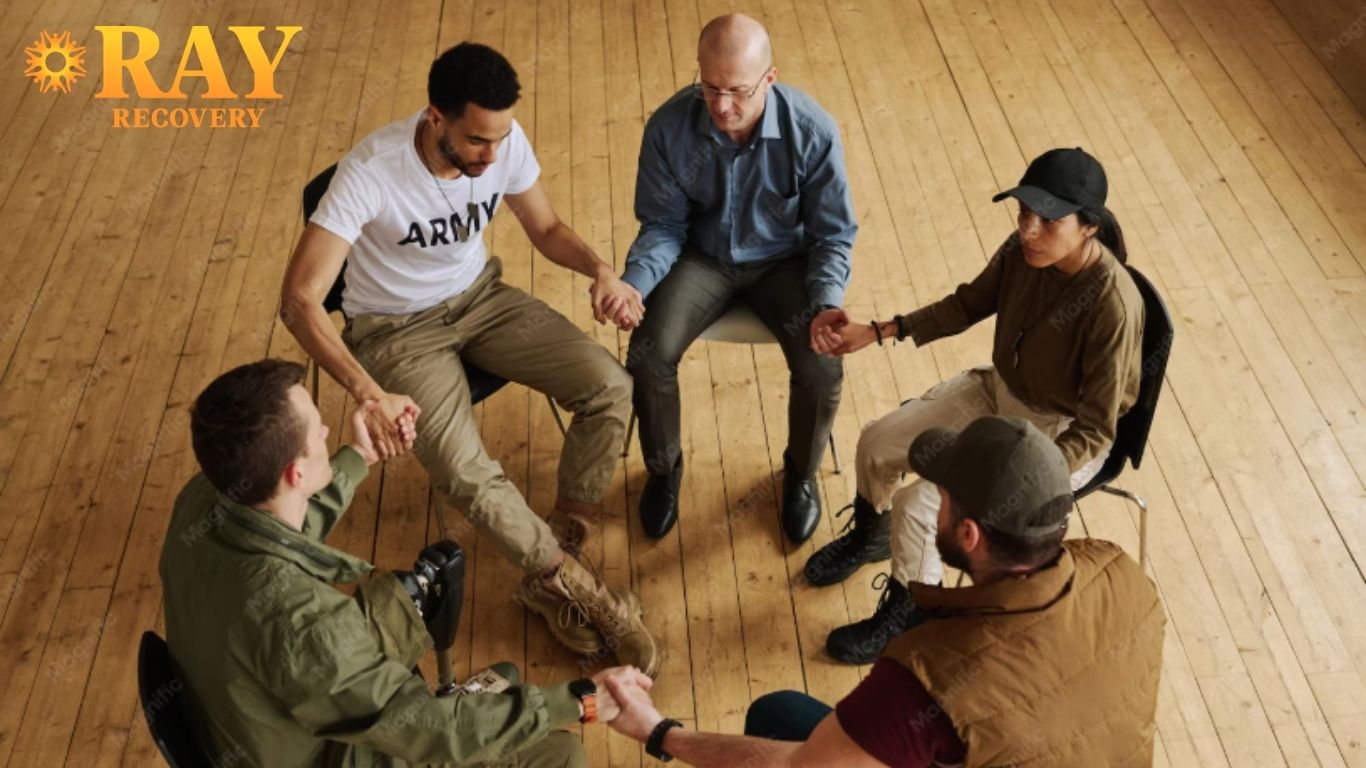 Veterans and Addiction: Why Military Service Increases the Risk, and What Treatment Should Actually Address 2 Veterans in a group therapy and peer support session